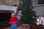 boys decorating tree