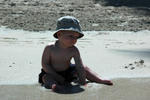 Jack splashing on beach