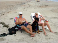 dave, kristin, and their beach-rental puppy
